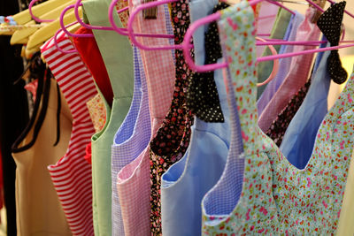 Clothes hanging in store for sale in market