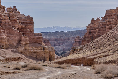Path along valley of castles gorge, charyn canyon national nature park in kazakhstan.