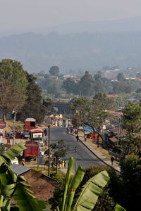 High angle view of trees and mountains against sky