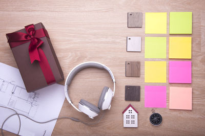 High angle view of multi colored paper on table