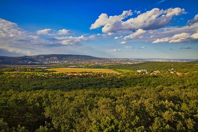 Scenic landscape view with green mountains and cloudy sky