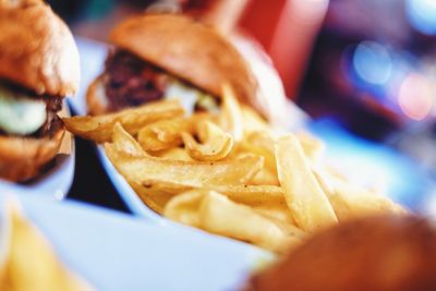 French fries with burgers served in tray