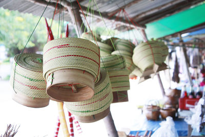 Low angle view of wicker baskets in market for sale