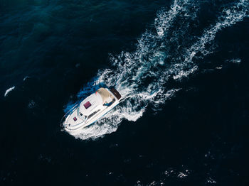 High angle view of man in boat at sea