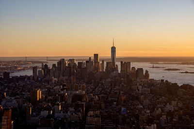High angle view of city at sunset