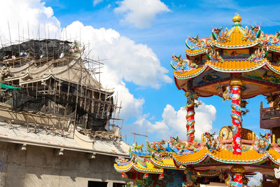 Low angle view of traditional building against sky