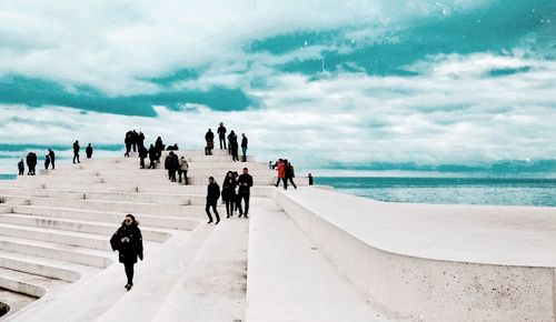 People walking on beach