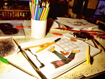 High angle view of multi colored pencils on table