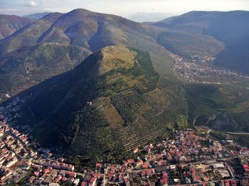 High angle view of townscape against mountains