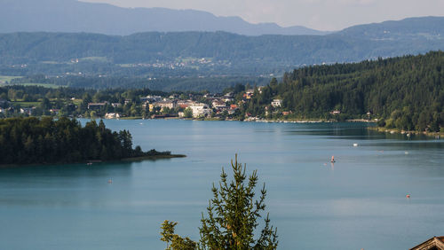 Scenic view of lake and mountains against sky