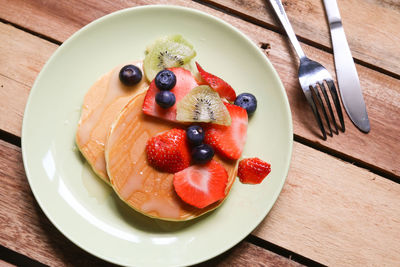 High angle view of breakfast in plate on table