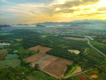 High angle view of townscape against sky during sunset