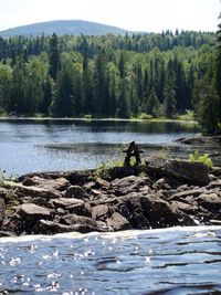 Scenic view of lake against trees