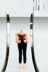 Midsection of woman photographing
