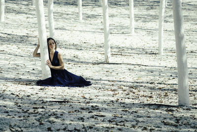 Woman sitting on the ground