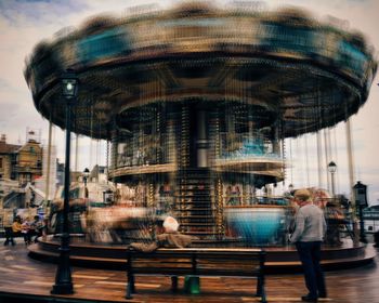 People at amusement park