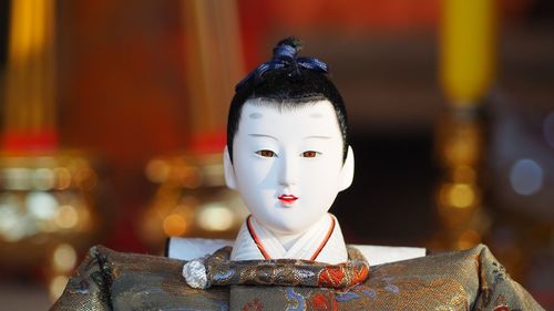 Close-up of buddha statue in store