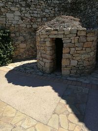 Shadow on stone wall