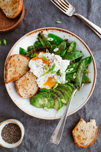 High angle view of breakfast served on table