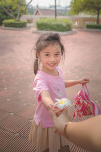 Portrait of cute girl smiling