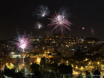 Firework display at night