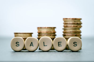 Close-up of coins on table