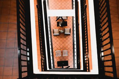 Directly above shot of chairs in building