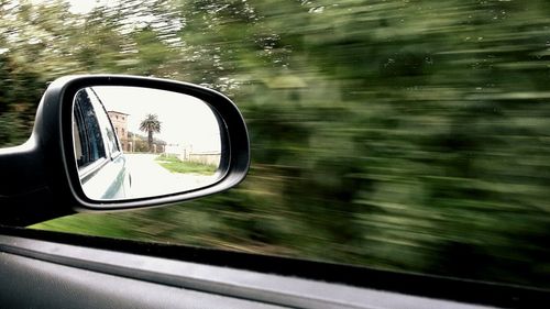 Road seen through car windshield