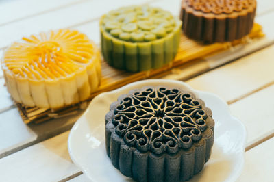 High angle view of moon cakes on table