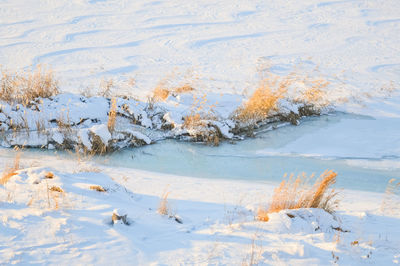 High angle view of snow covered land