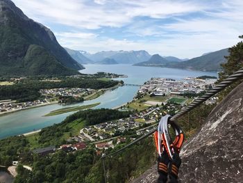 Scenic view of river amidst mountains against sky