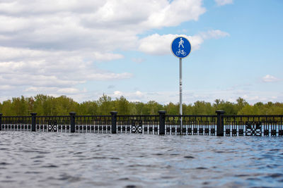 A picturesque view of the river embankment flooded with water.