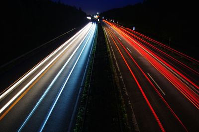 Light trails on road at night