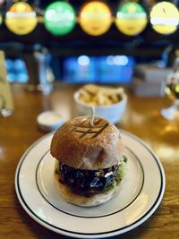 Close-up of burger in plate on table