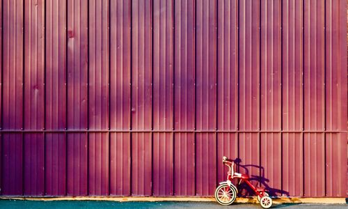 Bicycle against brick wall