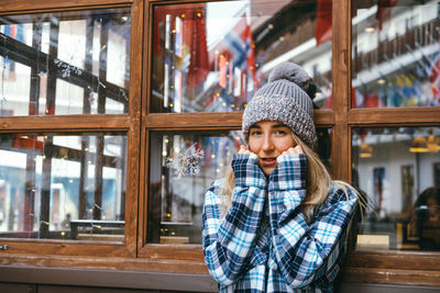 Portrait of young woman in park