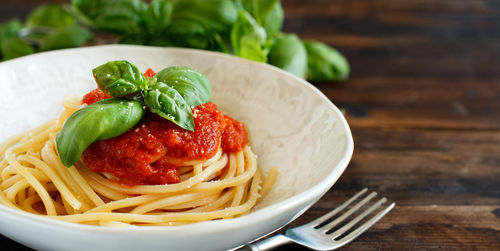 Close-up of pasta in plate on table