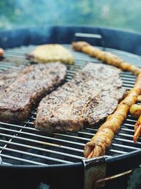 Close-up of meat on barbecue grill