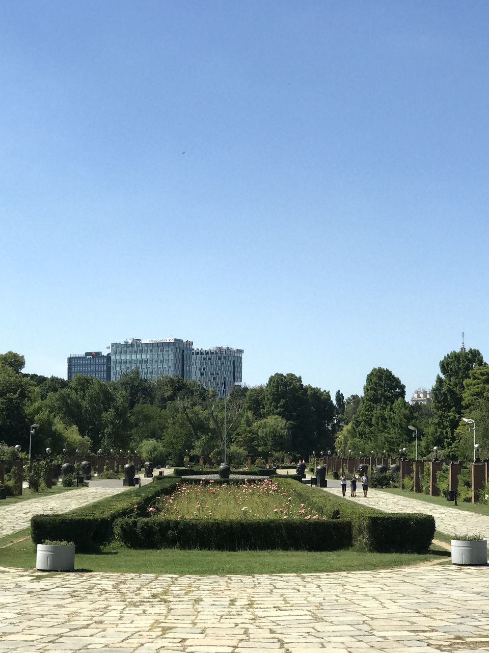 VIEW OF PARK AGAINST CLEAR BLUE SKY