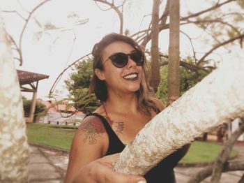 Portrait of young woman in sunglasses