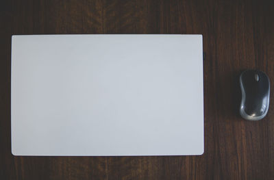 High angle view of empty coffee cup on table
