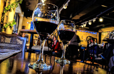 Tilt shot of wine served on table at nightclub