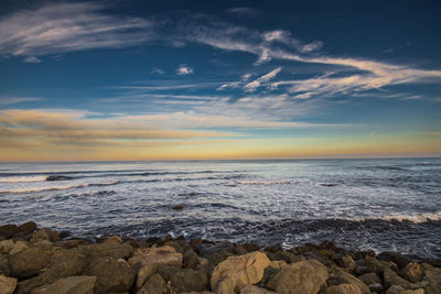 Scenic view of sea against sky during sunset