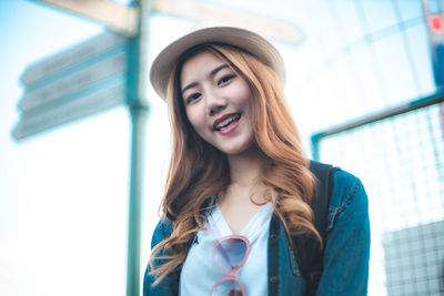 Portrait of smiling young woman