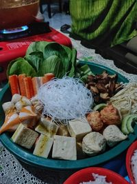 Close-up of chopped vegetables in bowl on table