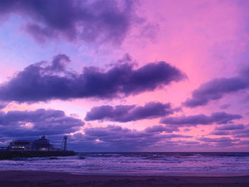 Scenic view of sea against dramatic sky