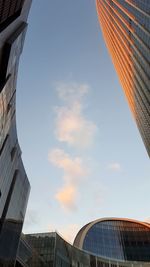 Low angle view of modern buildings against sky