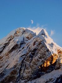 Low angle view of mountain peak against sky