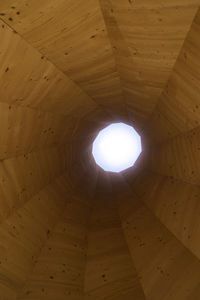 Low angle view of illuminated ceiling