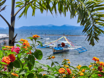 Scenic view of sea against cloudy sky